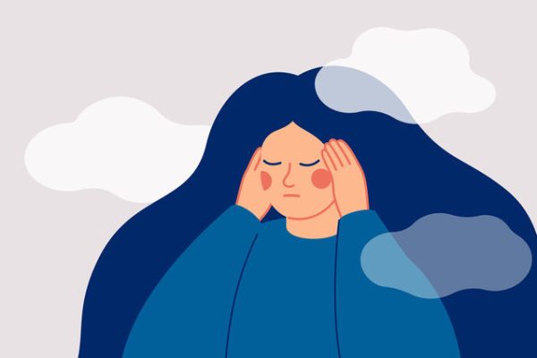 The sad woman touches her temples with her hands and suffers from a headache. A depressed girl suffers from temporary memory loss and confusion. Vector illustration