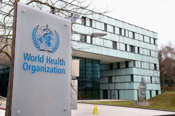 FILE PHOTO: A logo is pictured outside a building of the  World Health Organization (WHO) during an executive board meeting on update on the coronavirus outbreak, in Geneva, Switzerland, February 6, 2020. REUTERS/Denis Balibouse/File Photo